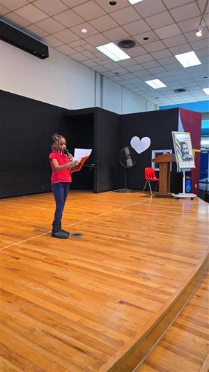 student hosting MLK performance